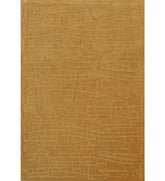 Golden mustard hand-tufted wool rug with subtle embossed pattern